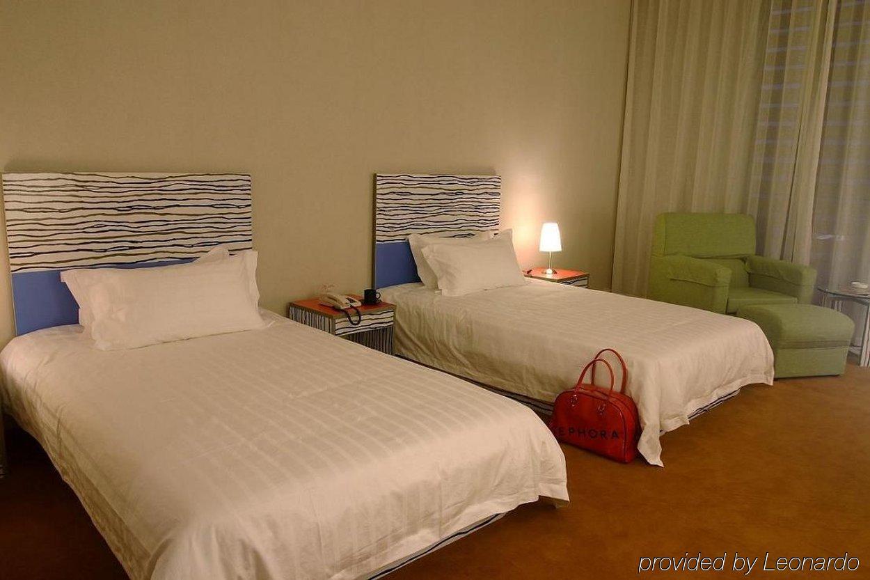 The Land Hotel Shanghai Rum bild